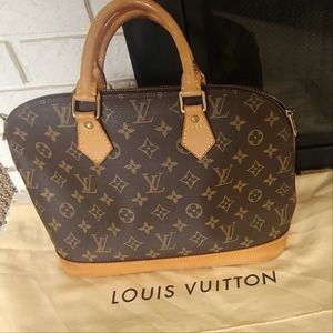 Louis Vuitton Alma Bag. Authentic. Includes dustbag.
